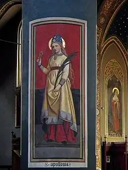 Apollonia van Alexandrië met tang en palmtak (Piëmont, Italië)