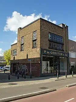 Filiaal aan de Gasthuisring (1933) in Tilburg (2015)