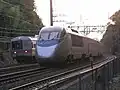 Een Metro-North trein en een Acela Express