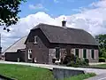 Boerderij met rieten zadeldak