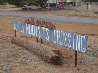 "CAUTION NUDIST'S CROSSING"