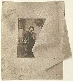 Reproductie van een litho van Adolphe Mouilleron naar een schilderij van Nicolaas Pieneman van Rembrandt die een etsproef bestudeert, met trompe-l'oeil-effect, ca. 1855