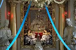 Main altar in the church in Będków