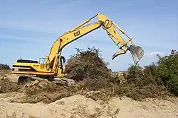 Caterpillar graafmachine (dieplepel) op rupsbanden
