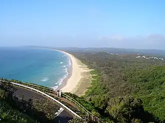 Tallow Beach, Byron Bay; Nationaal park Arakwal ligt rechts op de foto