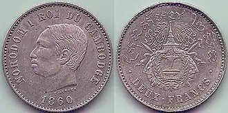 Een munt van 2 frank met het jaartal 1860 erop.