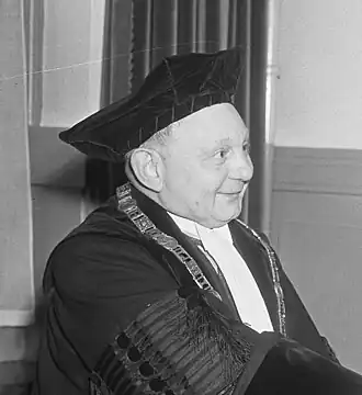 Petit als rector magnificus van de K.U. Nijmegen bij de oratie van W.J.M.A. Asselbergs, 1953