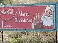 Ook in Israël heeft kerstmis een commercieel tintje gekregen, reclame van Coca Cola in Nazareth