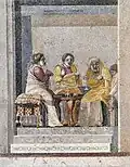 Het raadplegen van een heks. Mozaïek van Dioskourides of Samos uit het Huis van Cicero, Pompeï. 1e of 2e eeuw v.Chr.