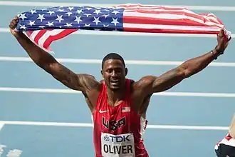 David Oliver viert zijn overwinning op de WK van 2013, Moskou.