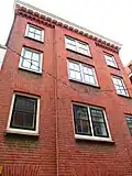 Pakhuis, gebouwd rond 1900 in voor die periode karakteristieke utilitaire architectuur.