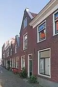 Woonhuis uit de 19de eeuw in sobere traditionele vormen.