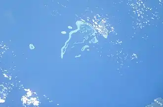 de Reefeilanden vanuit de ruimte