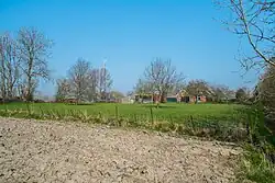 Gedeelte van de wierde van Elens met een huis