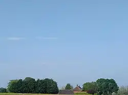 De hoeve:Erve Scholpenoirt, vanaf de zijkant.