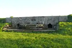 Opstelplaats voor een mitrailleur in de frontwal