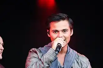 Giovanni Kemper tijdens een optreden van Nachtwacht