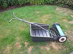 Handmatig aangedreven kooimaaier met opvangbak