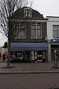 Winkelpand/magazijn met bovenwoning