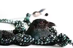 Vogelcollier Zwart, onderdeel van sieraadcollectie MAD Museum New York.