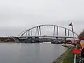 Het verplaatsen van de nieuwe boogbrug van Viversel op zondag 11 december 2022