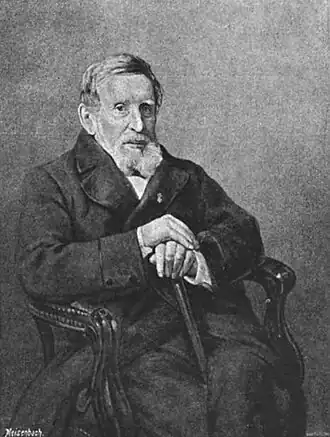 J.J.A. Goeverneur, olieverfportret door J.H.Egenberger. De schrijver draagt zijn kruis uit de tiendaagse veldtocht in zijn knoopsgat.