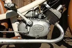 ILO-bromfietsblok met inwendig een "pianosnaar" (tandriem)