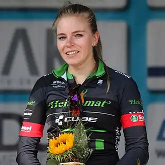 Krahl op het podium van de GGEW Grand Prix op 11 September 2022 in Bensheim.