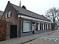 Woonhuis/winkel