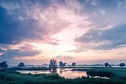 De Cloppenwaard in de avondzon