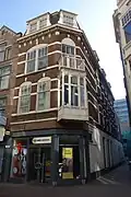 Winkel-woonhuis in neorenaissance-stijl