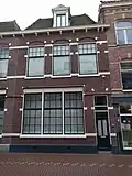 Schoolgebouw Chr. Frobelschool, thans woningen en woningbouwcomplexen