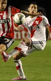 Vangioni (rechts) tijdens de Copa Sudamericana 2014