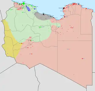 Kaart van de burgeroorlog in Libië. Het rode gebied staat onder controle van de regering in Tobroek, het groene onder het Nationaal Congres, het gele onder Toeareg-rebellen en het grijze onder Islamitische Staat.