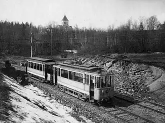 Motorwagen 323 (type SS), bouwjaar 1918, met bijwagen bij Bekkefaret op de Lilleakerbanen; jaren twintig.