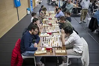 Limburg Open 2024, met vooraan de partij tussen Khoi Pham en Lorenzo Lodici