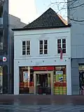 Woonhuis/winkel