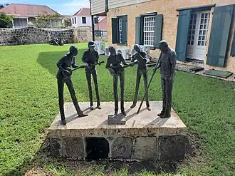 Hippie Band-monument bij het Governments Guesthouse