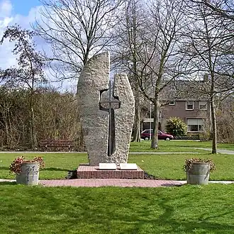 Het gedenkteken aan de  Woudweg ter nagedachtenis aan de fusillade