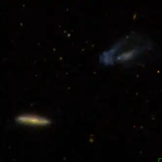 NGC 3006 (linksonder)