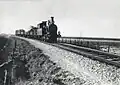 Stoomlocomotief uit de serie 7100 van de N.S. met een trein tussen Hantum en Ternaard (26-04-1935).