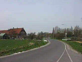 Negenhuizen komende vanuit het zuiden (De Kapel)