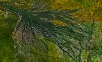 Fig. 4. De zeer uitgestrekte en vlakke puinwaaier van de rivier de Okavango bij Maun, Botswana.