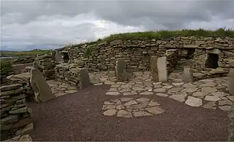 de binnenzijde van een Aisled Roundhouse van Old Scatness