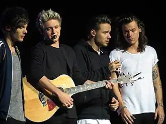Louis Tomlinson, Niall Horan, Liam Payne en Harry Styles tijdens het concert in Glasgow