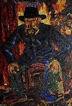 Mozaïek van de hand van de kunstenaar in dit gebouw