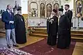 9 september 2013: Patriarch Bartholomeus I van Constantinopel bezoekt de kerk. De priesters zijn v.l.n.r. aartsbisschop Leo van Helsinki, Bartholomeus, metropoliet Stephanos van Tallinn