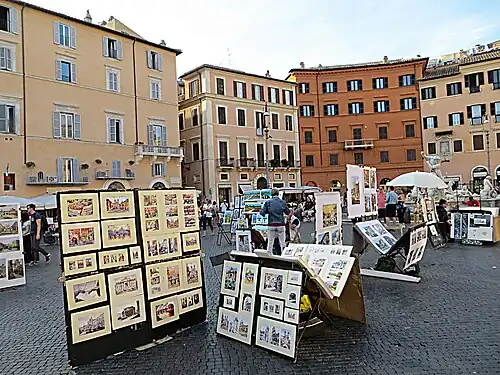 Schilderijenverkopers op het plein.