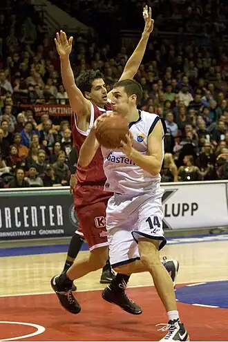 Marcel Aarts (links in rood) in 2010