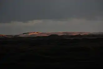 Råbjerg Mile in de schemering